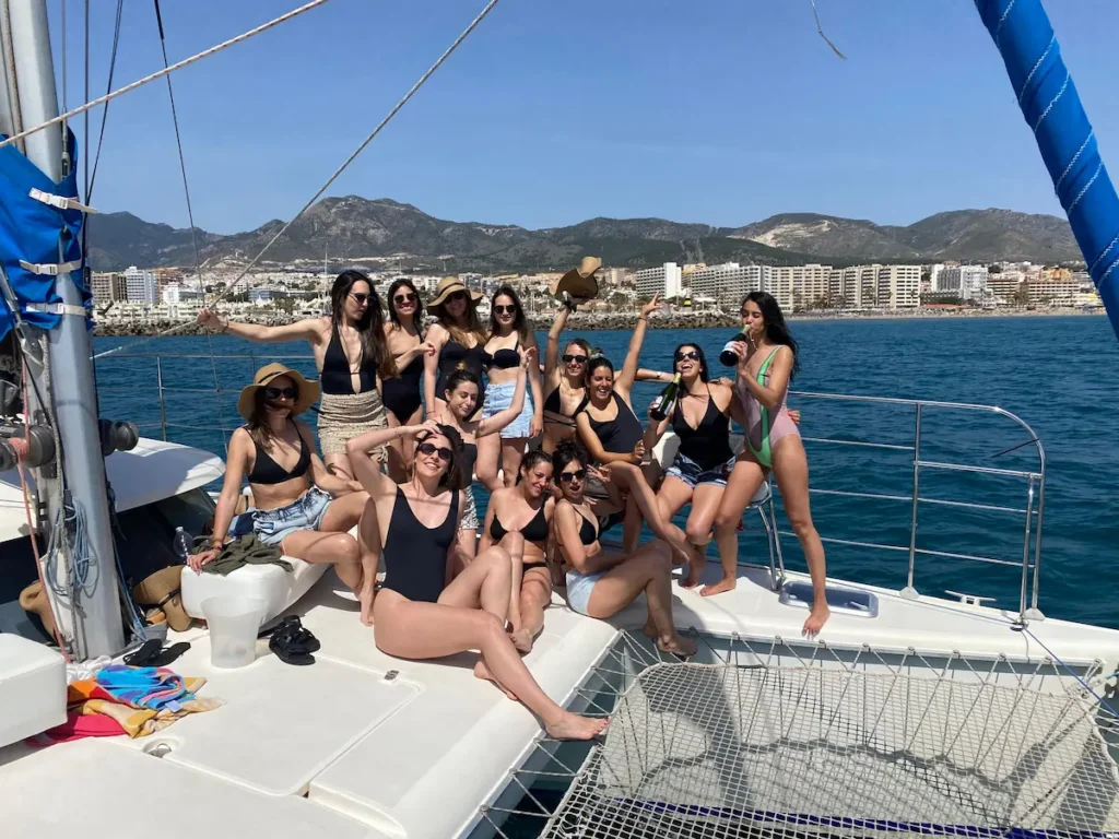 Private boat party in Benalmadena with friends celebrating at sea